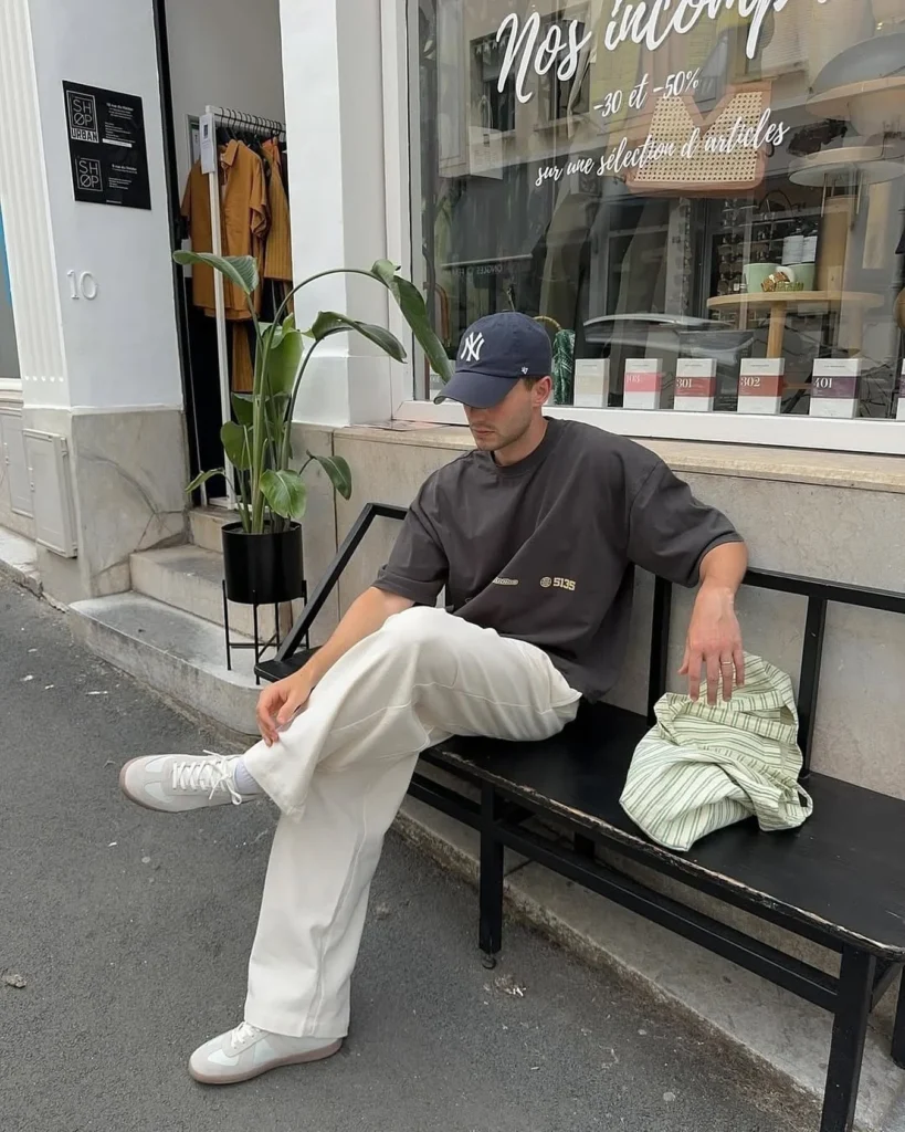 Urban Casual Look with Black Cap and White Sneakers