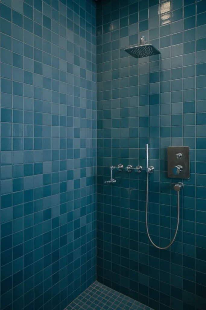 Blue Tile Bathroom with Textured Walls