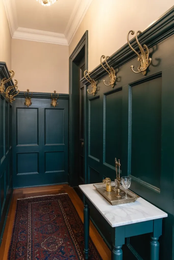 13 Mudroom Organization Ideas for a Clean Entryway Look Victorian Emerald Wainscoting and Brass Hooks