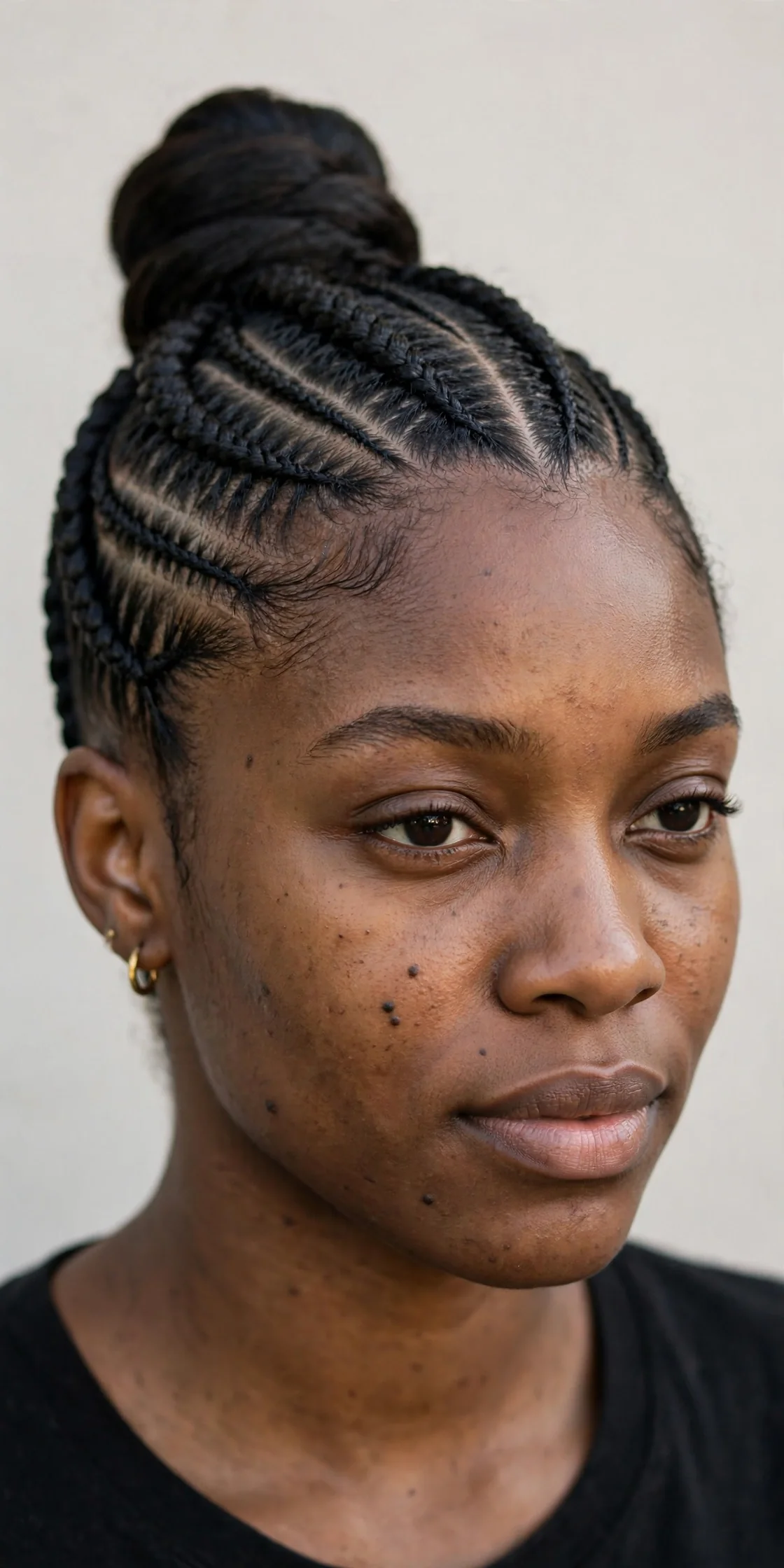 Stitch Braids in a Sleek High Bun
